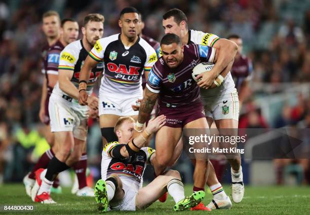 Dylan Walker of the Sea Eagles is tackled during the NRL Elimination Final match between the Manly Sea Eagles and the Penrith Panthers at Allianz...
