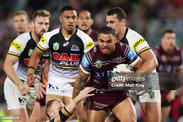 Dylan Walker of the Sea Eagles is tackled during the NRL Elimination Final match between the Manly Sea Eagles and the Penrith Panthers at Allianz...