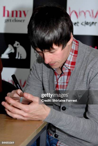Robert Pyne of The Rifles signs CD for fans at HMV on January 26, 2009 in Manchester, England.
