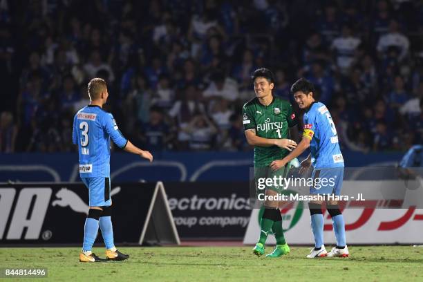 Tatsuki Nara and Jung Sung Ryong, Shogo Taniguchi cerabrate their 3-0 victory in the J.League J1 match between Kawasaki Frontale and Yokohama...