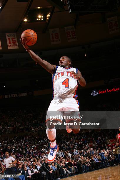 Nate Robinson of the New York Knicks shoots against the Houston Rockets during the game on January 26, 2009 at Madison Square Garden in New York, New...