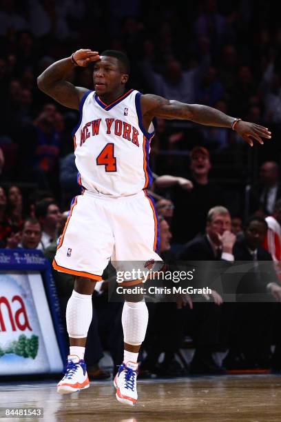 Nate Robinson of the New York Knicks celebrates a three point shot against the Houston Rockets at Madison Square Garden January 26, 2009 in New York...