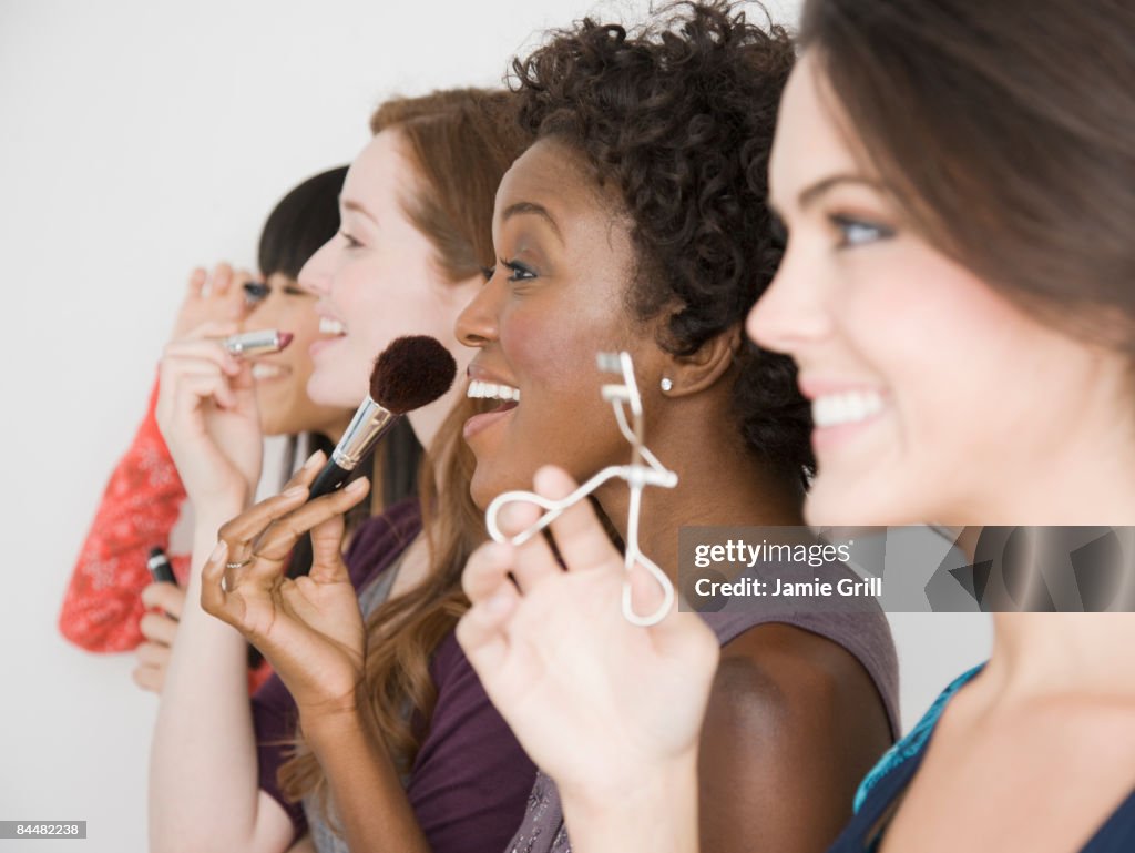 Group of Women Applying Make Up 