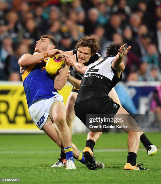 Jared Polec of the Power tackles Luke Shuey of the Eagles high during the AFL First Elimination Final match between Port Adelaide Power and West...