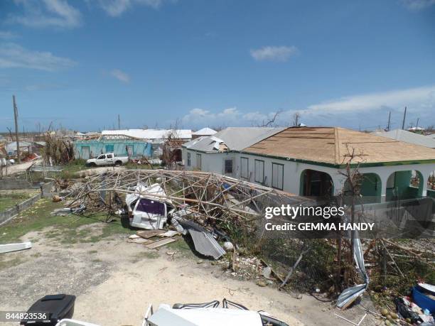 Houses are seen on September 8, 2017 in Codrington, Antigua and Barbuda, devastated by Hurricane Irma. Hurricane Irma on Thursday slashed its way...