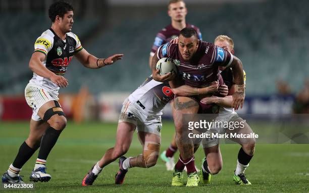 Addin Fonua-Blake of the Sea Eagles is tackled during the NRL Elimination Final match between the Manly Sea Eagles and the Penrith Panthers at...