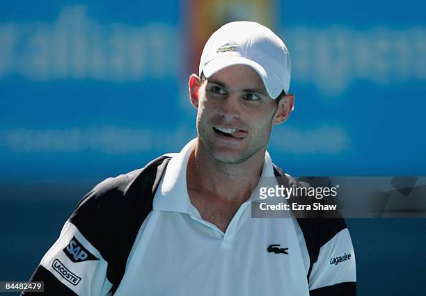 Andy Roddick of the United States of America reacts after a point in his quarterfinal match against Novak Djokovic of Serbia during day nine of the...