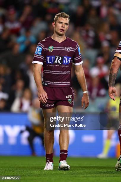 Tom Trbojevic of the Sea Eagles and his team mates looks dejected after a Panthers try during the NRL Elimination Final match between the Manly Sea...