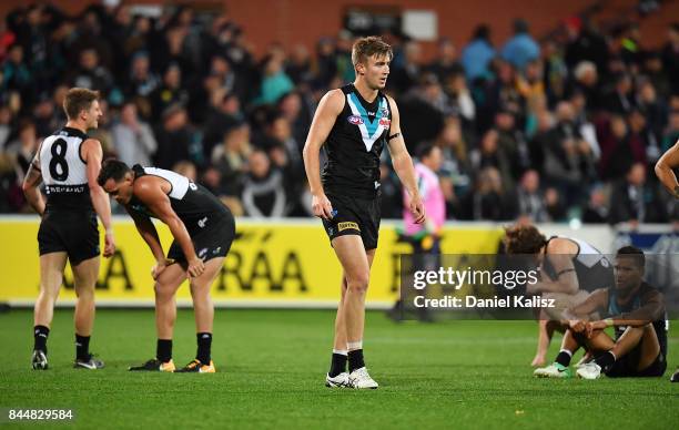 Power players look on dejected after the AFL First Elimination Final match between Port Adelaide Power and West Coast Eagles at Adelaide Oval on...