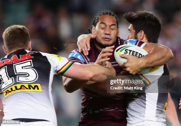 Martin Taupau of the Sea Eagles is tackled during the NRL Elimination Final match between the Manly Sea Eagles and the Penrith Panthers at Allianz...