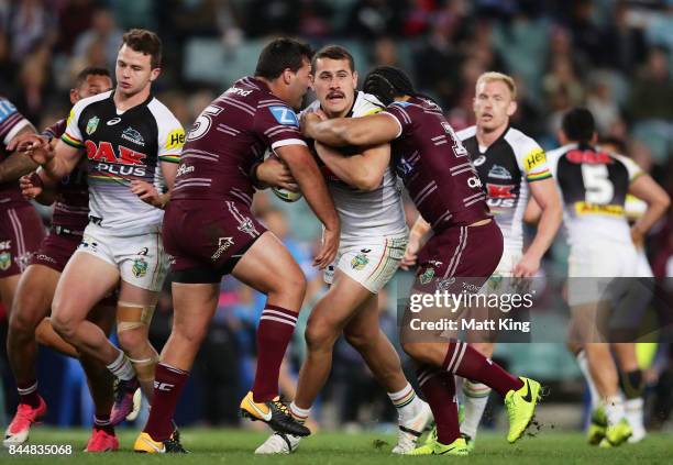 Reagan Campbell-Gillard of the Panthers is tackled during the NRL Elimination Final match between the Manly Sea Eagles and the Penrith Panthers at...