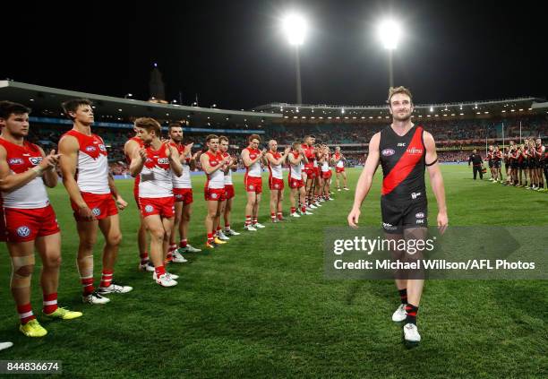 Retiring Bomber Jobe Watson leaves the field during the AFL Second Elimination Final match between the Sydney Swans and the Essendon Bombers at...