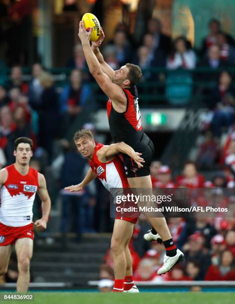 Tom Bellchambers of the Bombers marks the ball over Kieren Jack of the Swans during the AFL Second Elimination Final match between the Sydney Swans...