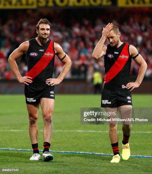 Retiring Bombers Jobe Watson and James Kelly leave the field during the AFL Second Elimination Final match between the Sydney Swans and the Essendon...