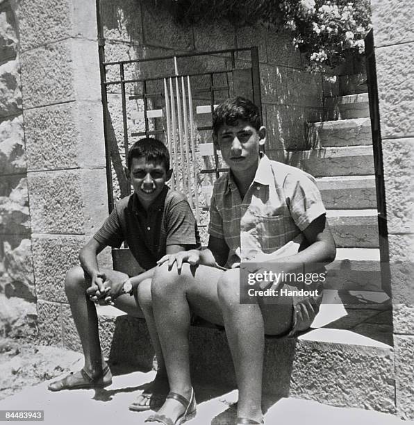 In this Israeli Government Press Office file photo, Benjamin Netanyahu , who would later become prime minister of Israel, with an unidentified friend...