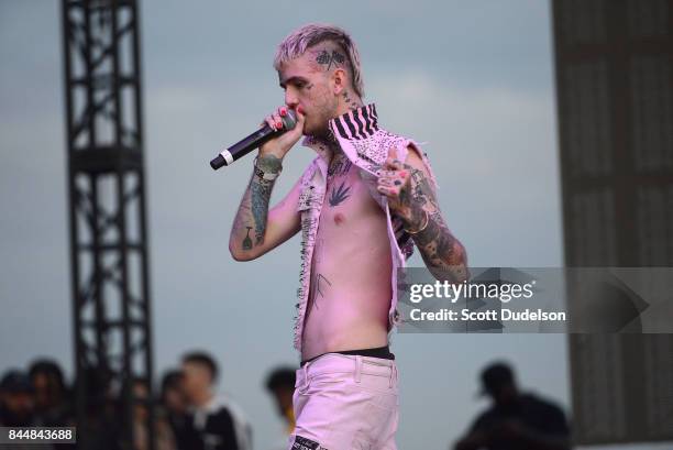 Rapper Lil Peep performs onstage during the Day N Night Festival at Angel Stadium of Anaheim on September 8, 2017 in Anaheim, California.