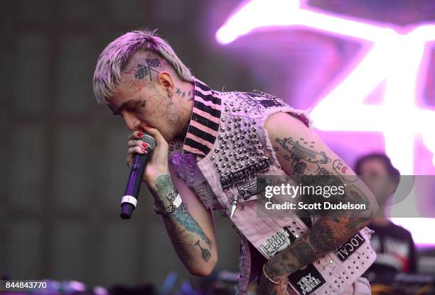 Rapper Lil Peep performs onstage during the Day N Night Festival at Angel Stadium of Anaheim on September 8, 2017 in Anaheim, California.