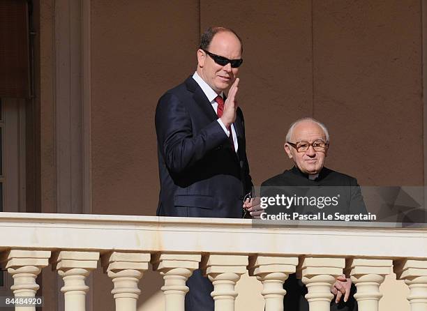 Prince Albert II of Monaco and Father Penzo attend the Sainte Devote ceremonies on January 27, 2009 in Monaco.