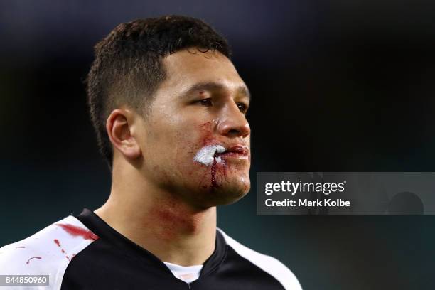 Dallin Watene-Zelezniak of the Panthers looks on as he bleeds from a cut on his mouth during the NRL Elimination Final match between the Manly Sea...