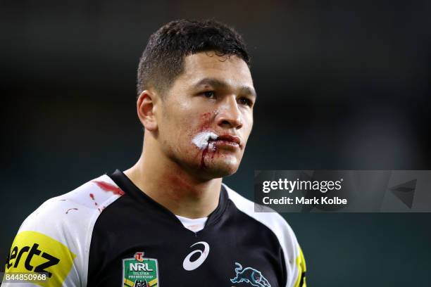 Dallin Watene-Zelezniak of the Panthers looks on as he bleeds from a cut on his mouth during the NRL Elimination Final match between the Manly Sea...