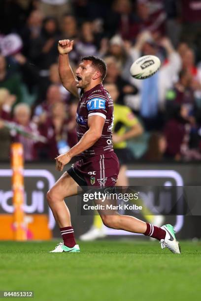 Lewis Brown of the Sea Eagles celebrates scoring a try during the NRL Elimination Final match between the Manly Sea Eagles and the Penrith Panthers...