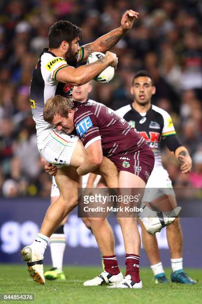 James Tamou of the Panthers is tackled by Jake Trbojevic of the Sea Eagles during the NRL Elimination Final match between the Manly Sea Eagles and...