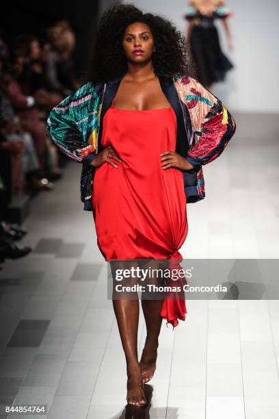 Model walks the runway wearing project runway design at Gallery 1, Skylight Clarkson Sq on September 8, 2017 in New York City.