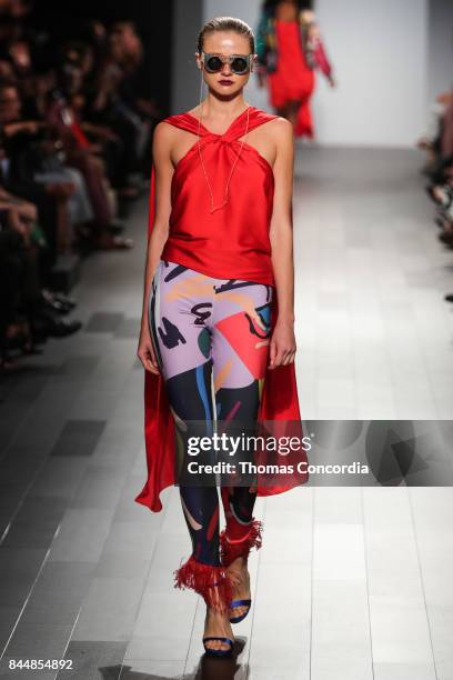 Model walks the runway wearing project runway design at Gallery 1, Skylight Clarkson Sq on September 8, 2017 in New York City.