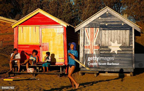 Boys play a game of cricket at Brighton Beach as a heatwave hits Melbourne on January 27, 2009 in Melbourne, Australia. The temperature today is...