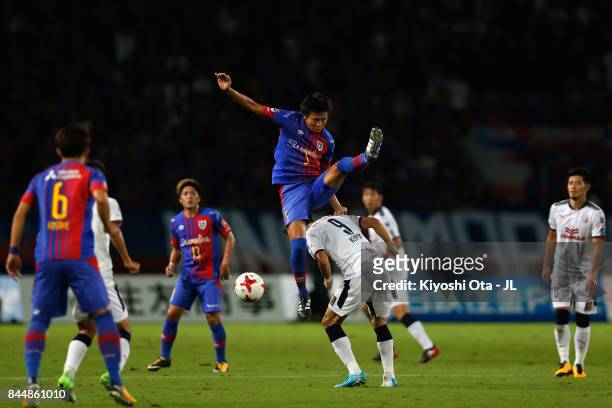 Yuichi Maruyama of FC Tokyo and Kenyu Sugimoto of Cerezo Osaka compete for the ball during the J.League J1 match between FC Tokyo and Cerezo Osaka at...