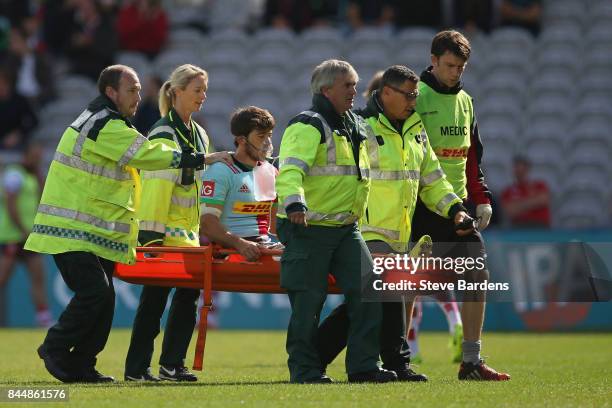 Demetri Catrakilis of Harlequins leaves the field after getting an injury during the Aviva Premiership match between Harlequins and Gloucester Rugby...