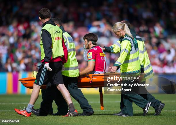 Harlequins' Demetri Catrakilis leaves the field during the Aviva Premiership match between Harlequins and Gloucester Rugby at Twickenham Stoop on...