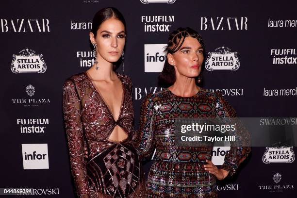 Laura Love and Crystal Renn attend the 2017 Harper ICONS party at The Plaza Hotel on September 8, 2017 in New York City.