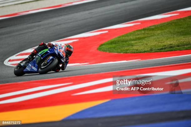 Movistar Yamaha's spanish rider Maverick Vinales rides his bike during a qualifying session for the San Marino Moto GP Grand Prix race at the Marco...