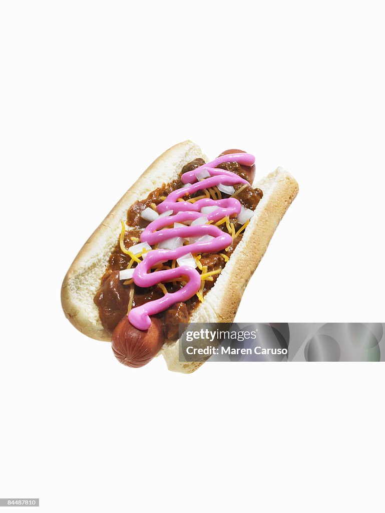Chili dog with pepto pismo as a topping.