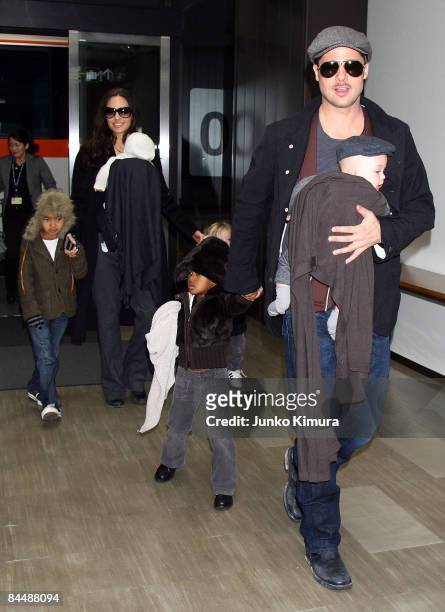 Actor Brad Pitt and Angelina Jolie arrive at Narita International Airport with their children Maddox, Vivienne, Zahara and Knox on January 27, 2009...