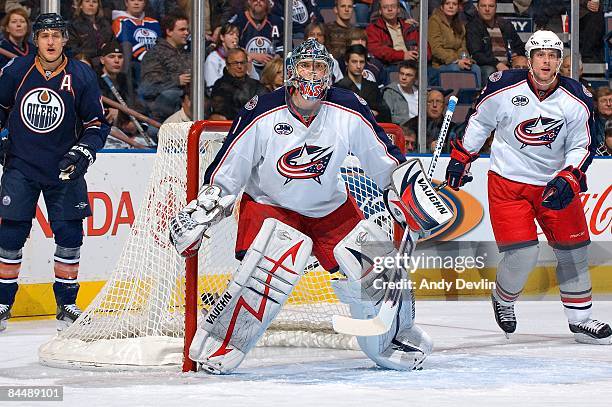 Steve Mason of the Columbus Blue Jackets concentrates on the puck during a game against the Edmonton Oilers at Rexall Place on January 20, 2009 in...