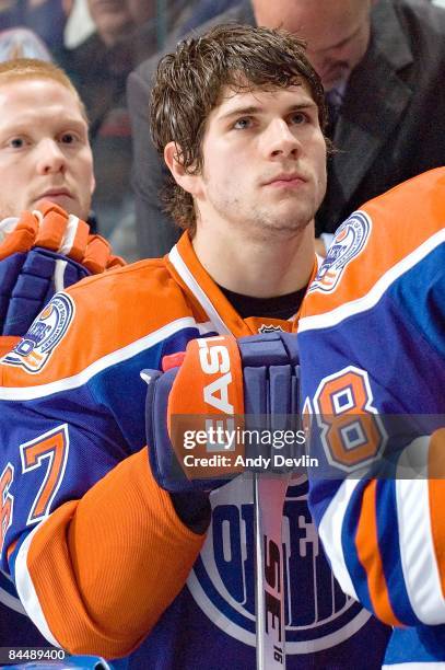 Gilbert Brule of the Edmonton Oilers stands for the National Anthems before a game against the Phoenix Coyotes at Rexall Place on January 18, 2009 in...