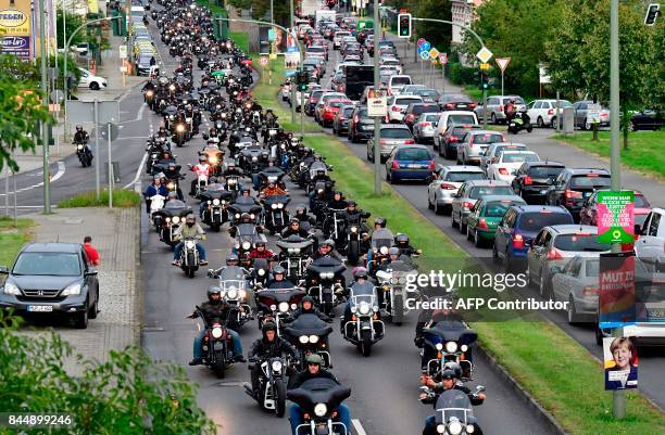 Members of the "Hells Angels" motorcycle club ride their motorbikes during a demonstration on September 9, 2017 in Berlin. Members of the club staged...