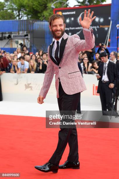Festival host Alessandro Borghi arrives at the Award Ceremony of the 74th Venice Film Festival at Sala Grande on September 9, 2017 in Venice, Italy.
