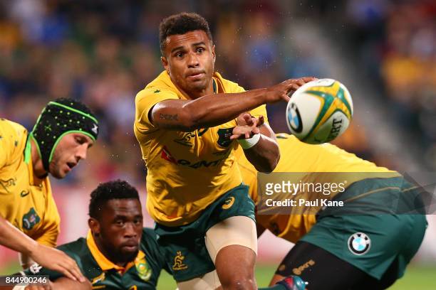 Will Genia of Australia paxses the ball during The Rugby Championship match between the Australian Wallabies and the South Africa Springboks at nib...