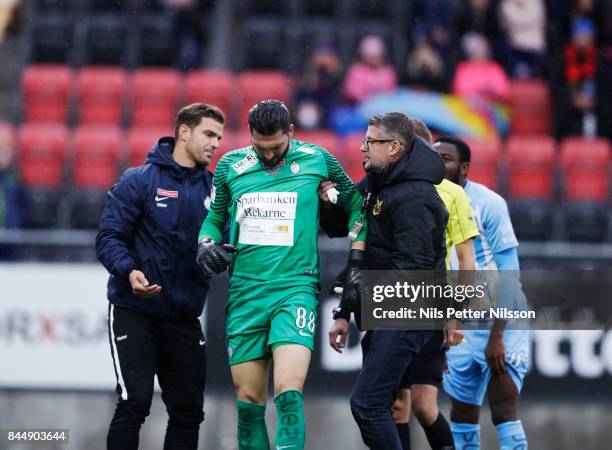 Alireza Haghighi, goalkeeperof Athletic FC Eskilstuna injured during the Allsvenskan match between Ostersunds FK and Athletic FC Eskilstuna at...