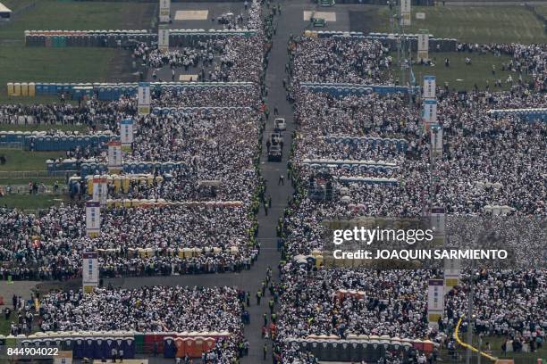 Pope Francis arrives in the popemobile to give mass at the Enrique Olaya Herrera airport in Medellin, Colombia, on September 9, 2017. Pope Francis...