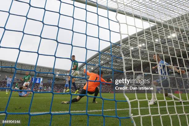 James Morrison of West Bromwich Albion scores his sides first goal past Mathew Ryan of Brighton and Hove Albion during the Premier League match...