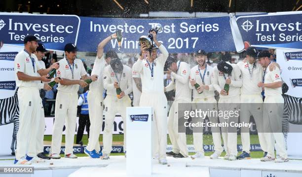 England captain Joe Root lifts the series trophy after winning the 3rd Investec Test match between England and the West Indies at Lord's Cricket...