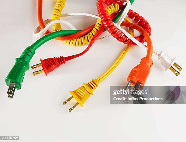 tangled colorful electric plugs - rats nest stock pictures, royalty-free photos & images