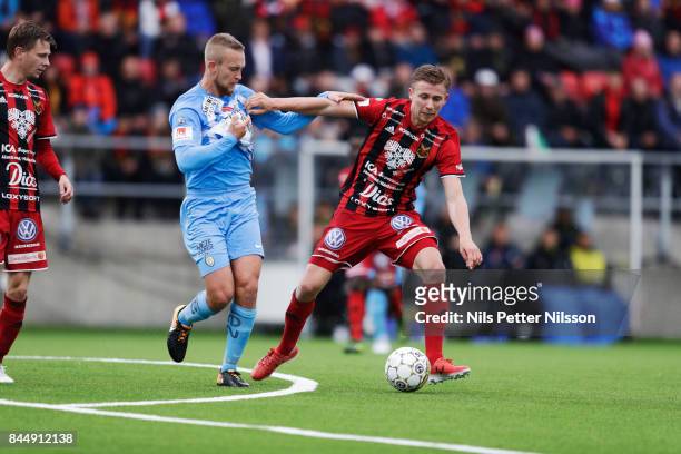 Alexander Michel of Athletic FC Eskilstuna and Ludvig Fritzon of Oestersunds FK competes for the ball during the Allsvenskan match between Ostersunds...