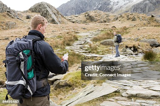 Guy Using A Compass A Man Using A Compass High-Res Stock Photo - Getty Images