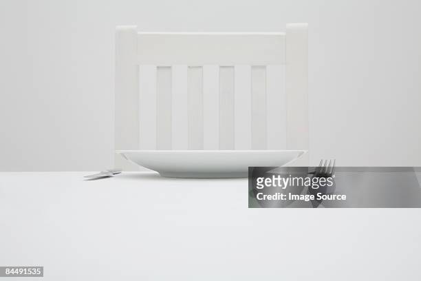 chair plate and cutlery - white plate stock pictures, royalty-free photos & images