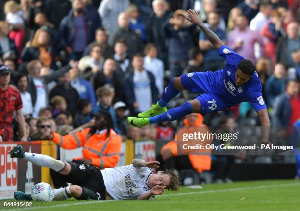 Fulham's Stefan Johansen vies with Cardiff City's Nathaniel Mendez-Laing during the Sky Bet Championship match at Craven Cottage, London.